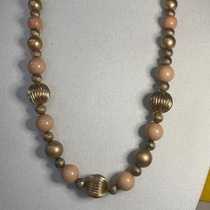 Long vintage cream peach and textured Goldtone bead necklace